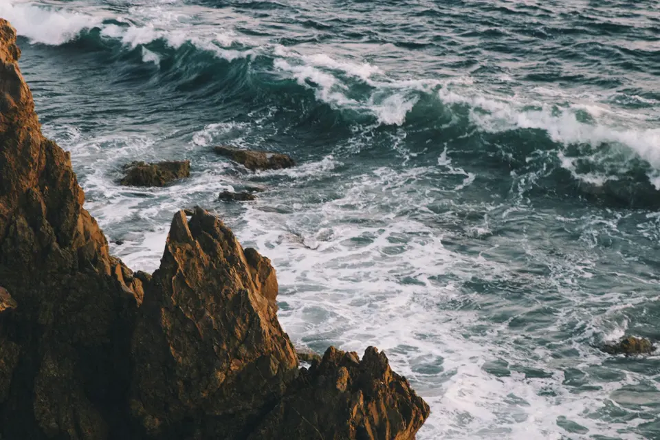 Waves and rocks along the shore at Corona del Mar in Newport Beach